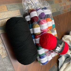 Tufting fabric and backing adhesive with assorted yarn